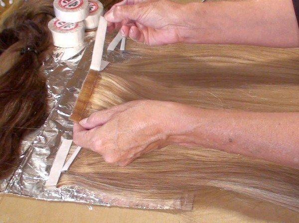 Single side seamless hair extension tape on a roll
